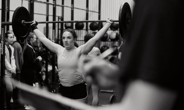 Breast-Cancer-Recovery Physiotherapist Katherine Lee lifting weights as part of a breast cancer recovery program